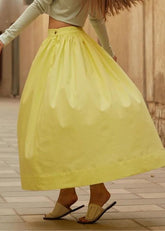 A Model Wearing Yellow Organic Cotton Aafra Skirt, curated by Only Ethikal